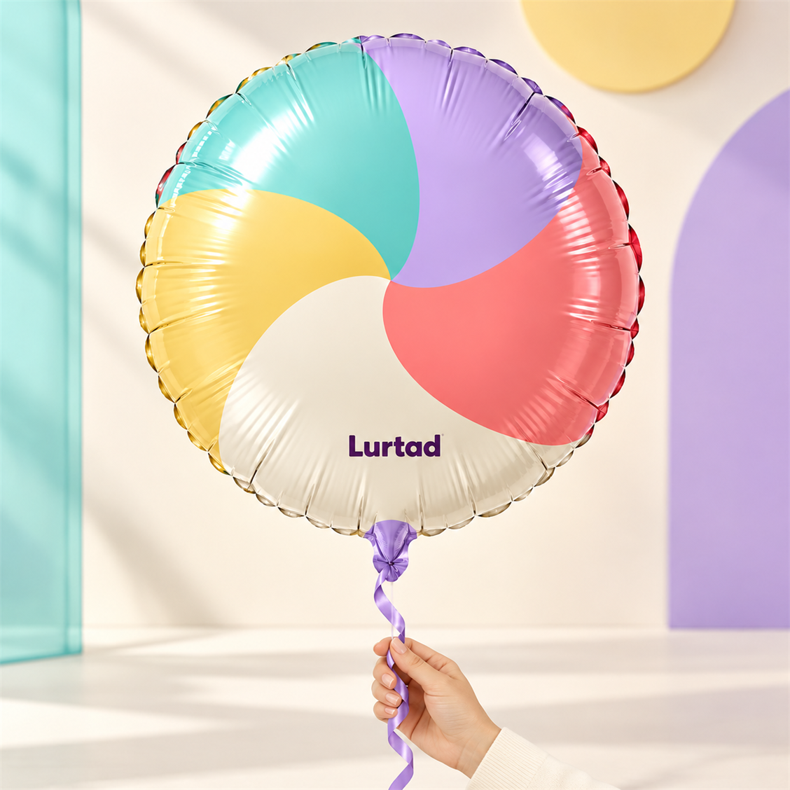 Lurtad Rainbow Swirl Foil Balloon detail and celebration view